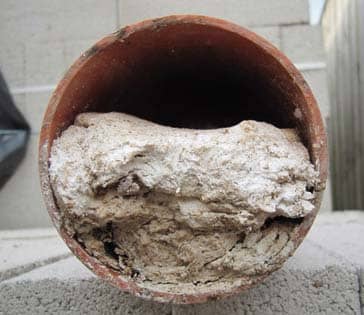 Clear Concrete from Drain Pipe